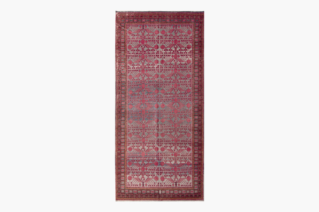 KHOTAN RUG, EAST TURKESTAN, 6'6" X 13'3"