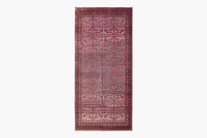 KHOTAN RUG, EAST TURKESTAN, 6'6" X 13'3"