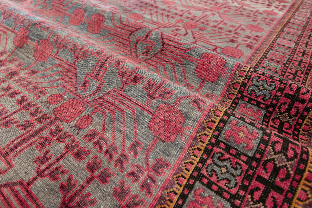 KHOTAN RUG, EAST TURKESTAN, 6'6" X 13'3"