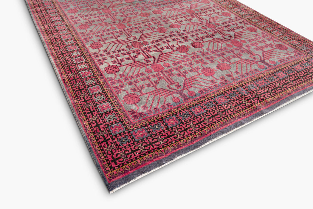 KHOTAN RUG, EAST TURKESTAN, 6'6" X 13'3"
