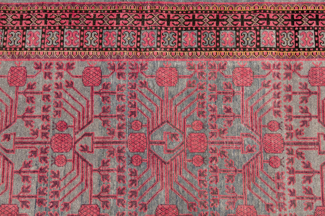KHOTAN RUG, EAST TURKESTAN, 6'6" X 13'3"