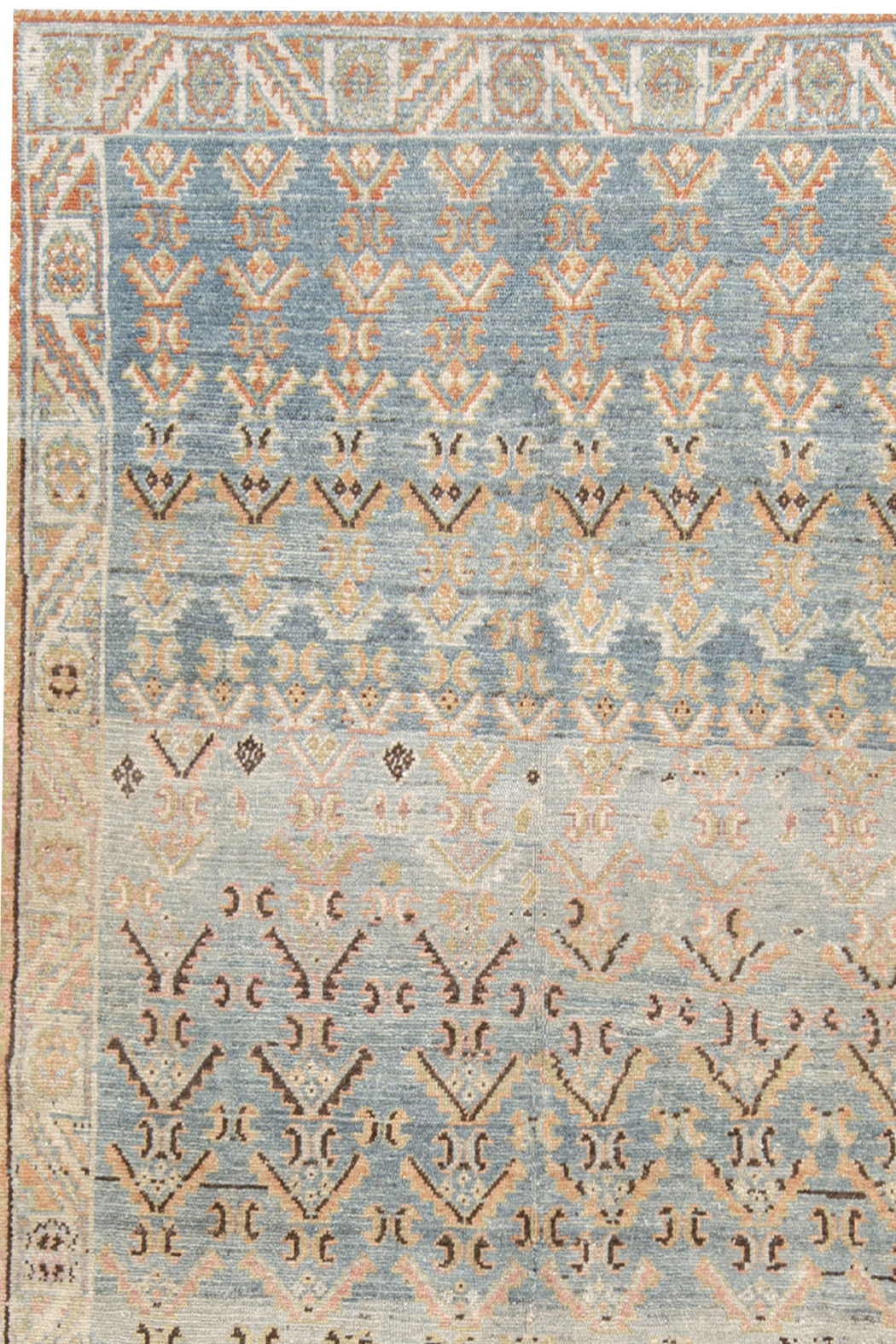 A rectangular heirloom MALAYIR RUG, AR30045/15857, WEST PERSIA, 4'4" X 6'9" by Ben Soleimani with a detailed geometric pattern in shades of light blue, beige, and brown. The design includes rows of intricate motifs and symmetrical shapes, creating a textured and ornate appearance. The border features a series of repeating smaller patterns, reminiscent of antique rugs.