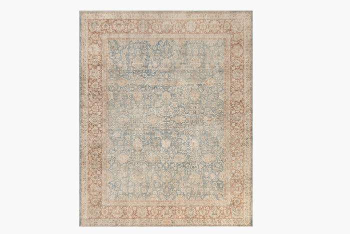 A rectangular rug featuring a detailed, intricate floral pattern. The center of the rug is predominantly light blue with cream accents, while the border is a mix of beige and light brown hues. This museum-quality KERMAN RUG, SOUTH EAST PERSIA, 10' 8" X 14' 8" by Ben Soleimani boasts an ornate and symmetrical design, capturing the essence of heirloom rugs.