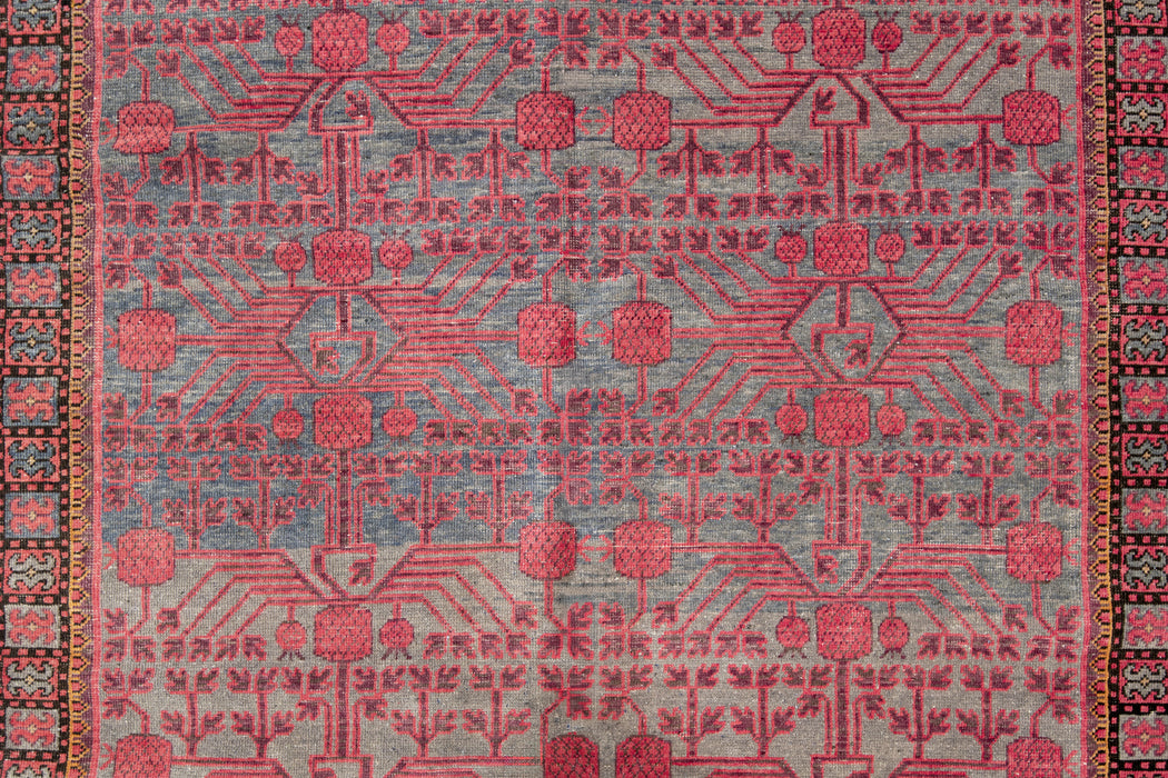 KHOTAN RUG, EAST TURKESTAN, 6'6" X 13'3"